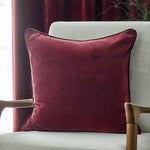 Heavy chenille piped cushion in rich mulberry burgundy colour, 50cm square