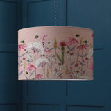 Add timeless elegance to your home with this Blush Lampshade. Featuring a beautiful floral and bumblebee design & perfect for table lamps or ceiling pendants.design.
