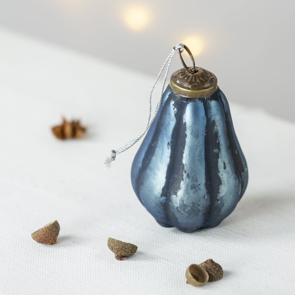 Ice blue pear-shaped Christmas bauble decoration with a subtle shimmering finish for festive tree styling.