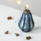 Ice blue pear-shaped Christmas bauble decoration with a subtle shimmering finish for festive tree styling.