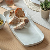 Ithaca white stoneware rectangular serving tray with softly curved edges and a natural glazed finish.