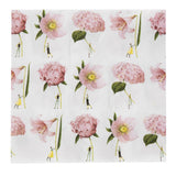 A paper napkin with a floral pattern featuring pink flowers and small figures holding them.