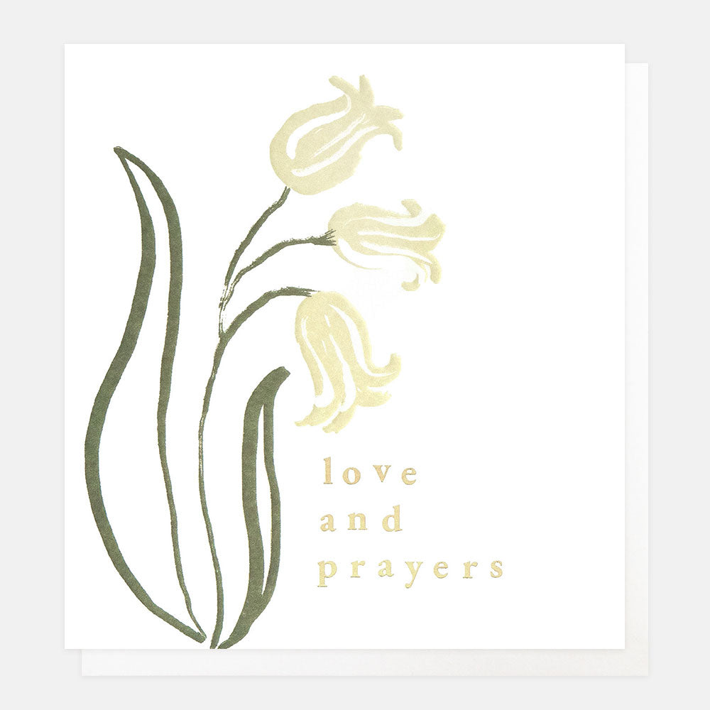 Send heartfelt condolences with this elegant Love & Prayers sympathy card. Featuring delicate white flowers with gold foil detailing, made in the UK.