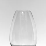 Mad Lilies Classic Glass Belly Vase, a tall 24cm clear glass flower vase designed for hand-tied bouquets and seasonal stems.