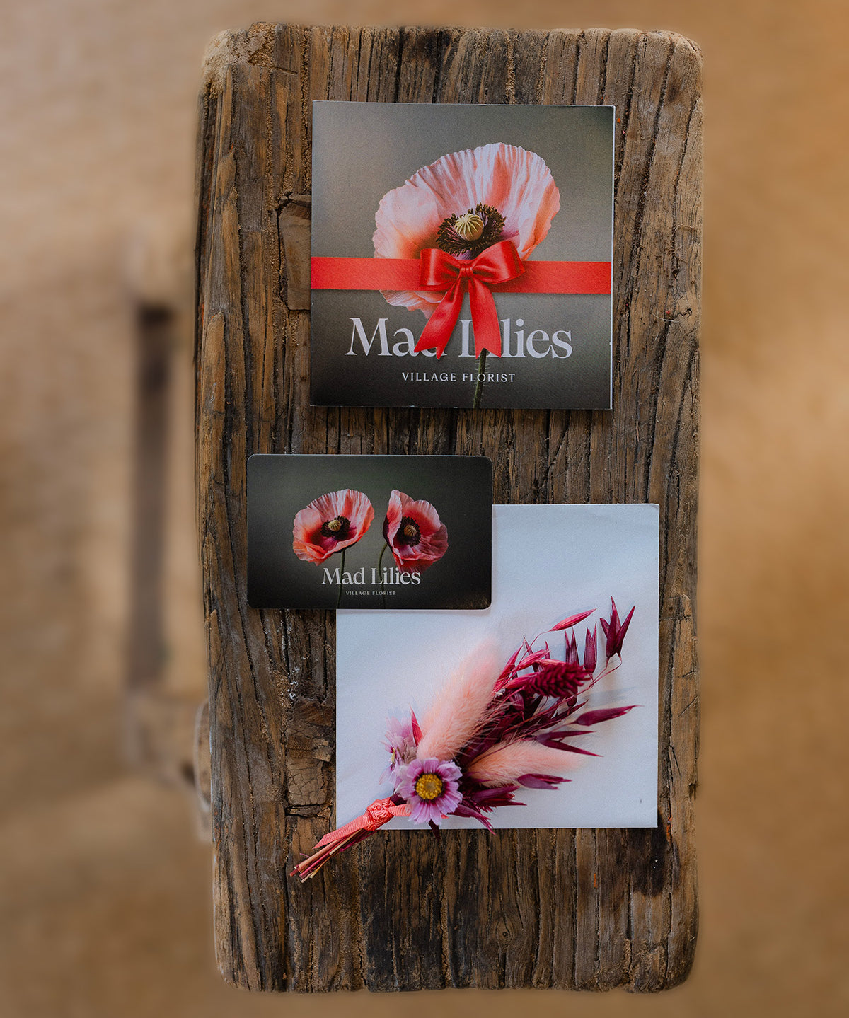 Mad Lilies physical gift voucher, a beautifully presented gift for luxury flowers, homeware and gifts from our Banstead boutique.