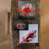 Mad Lilies physical gift voucher, a beautifully presented gift for luxury flowers, homeware and gifts from our Banstead boutique.