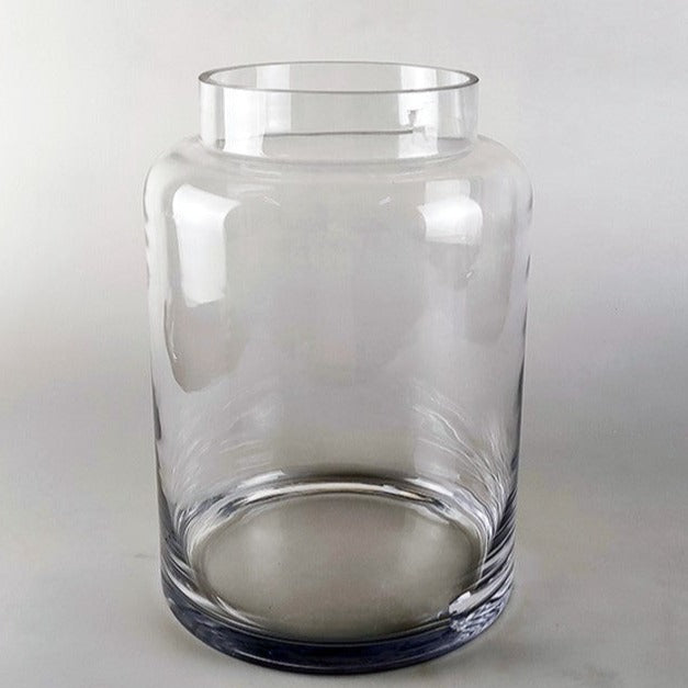 Mad Lilies Signature Apothecary Vase, a large 30.5cm clear glass flower vase with narrow neck for generous bouquets and tall seasonal stems.