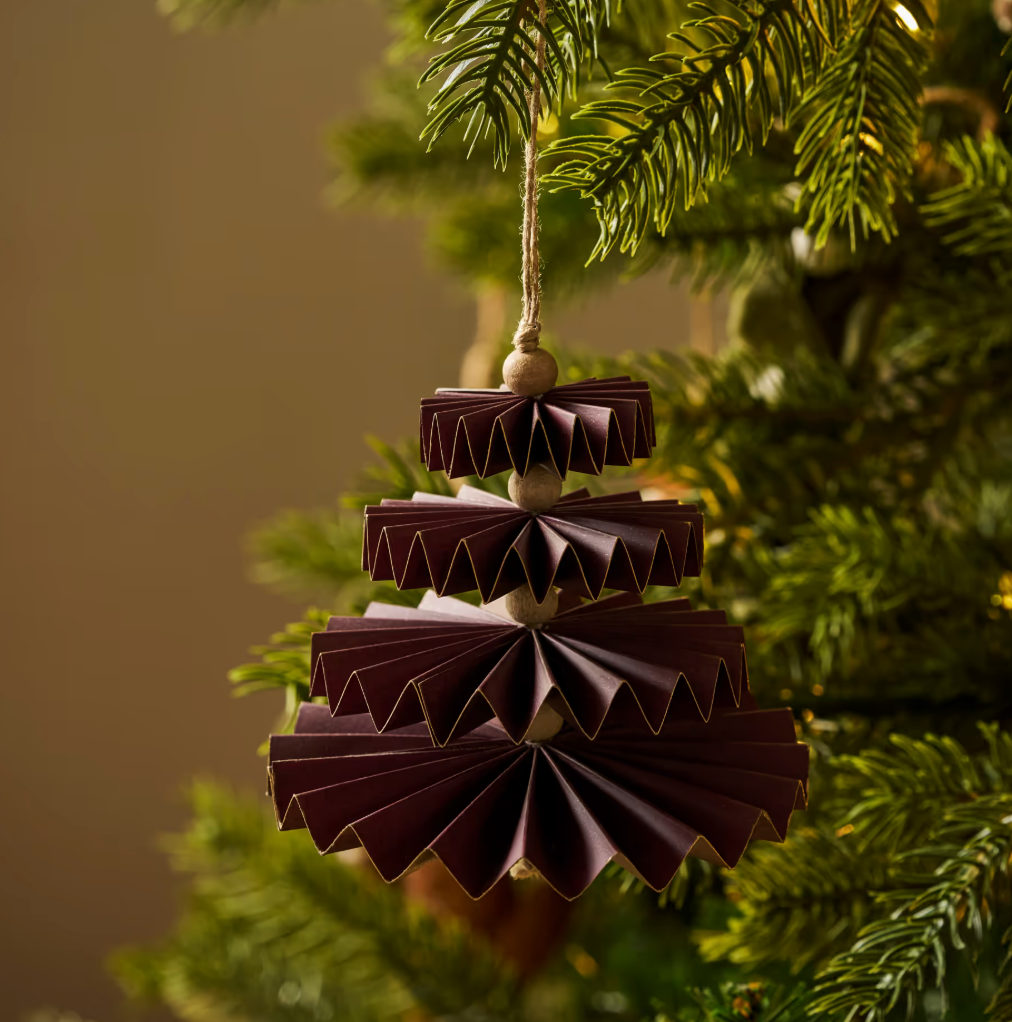 Set of three Maddox accordion-folded paper Christmas tree decorations with gold edging, available in Berry or Rosemary.