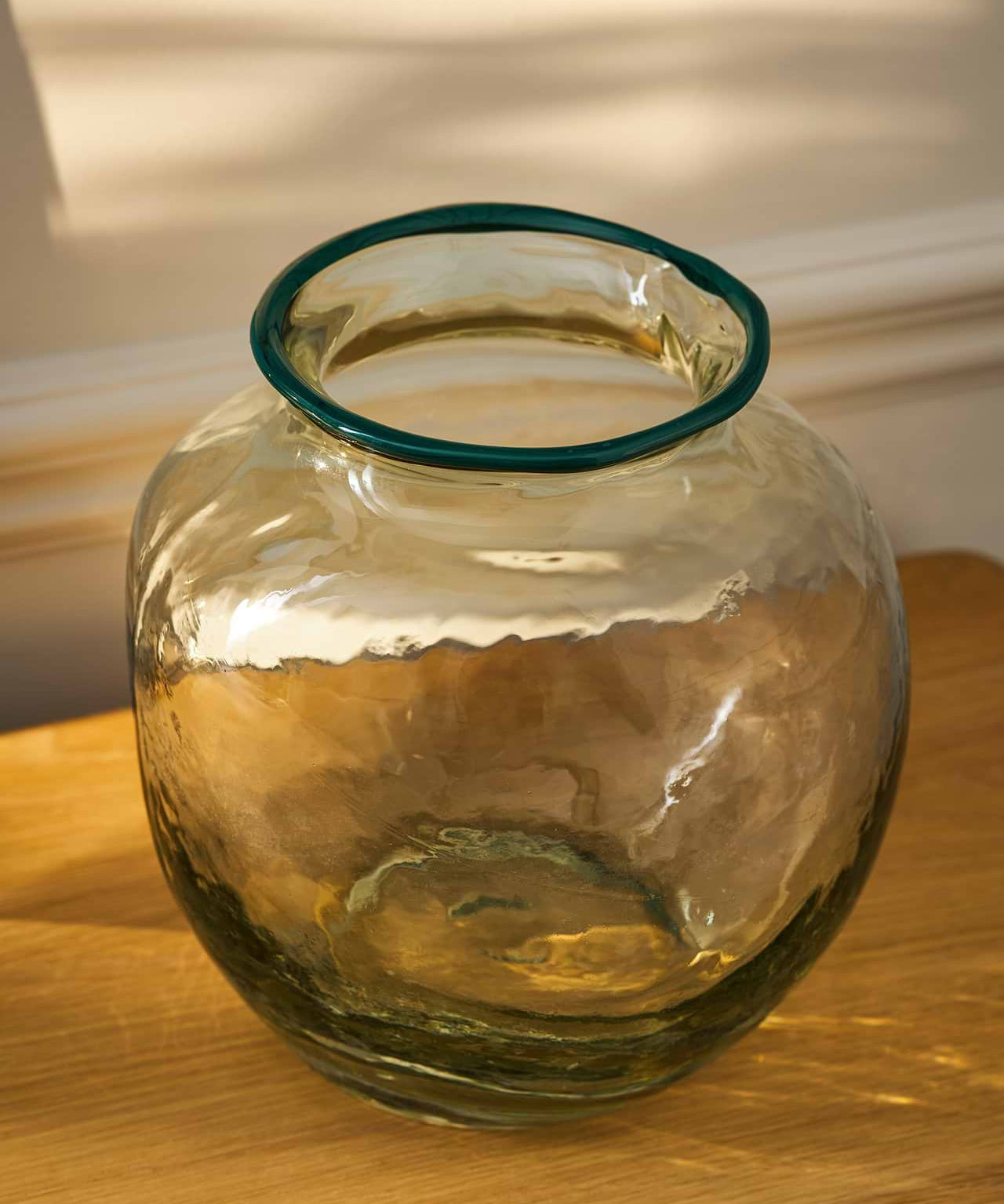 Madley Tipped recycled glass flower vase with an organic shape, clear glass body and decorative coloured rim.