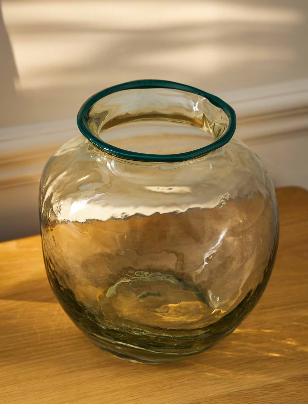 Madley Tipped recycled glass flower vase with an organic shape, clear glass body and decorative coloured rim.