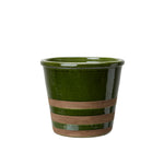 Manuela green melange terracotta plant pot with textured glazed finish, styled indoors with a houseplant in a contemporary home setting.