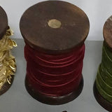 Maroon red 10mm velvet ribbon for luxury gift wrapping and crafts, available in 3 metres on a wooden biscuit or 10 metres on a wooden spool.