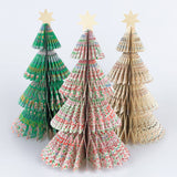 Shop Meri Meri x Liberty honeycomb Christmas trees. Set of 3 paper decorations in iconic Liberty prints, finished with metallic gold stars.