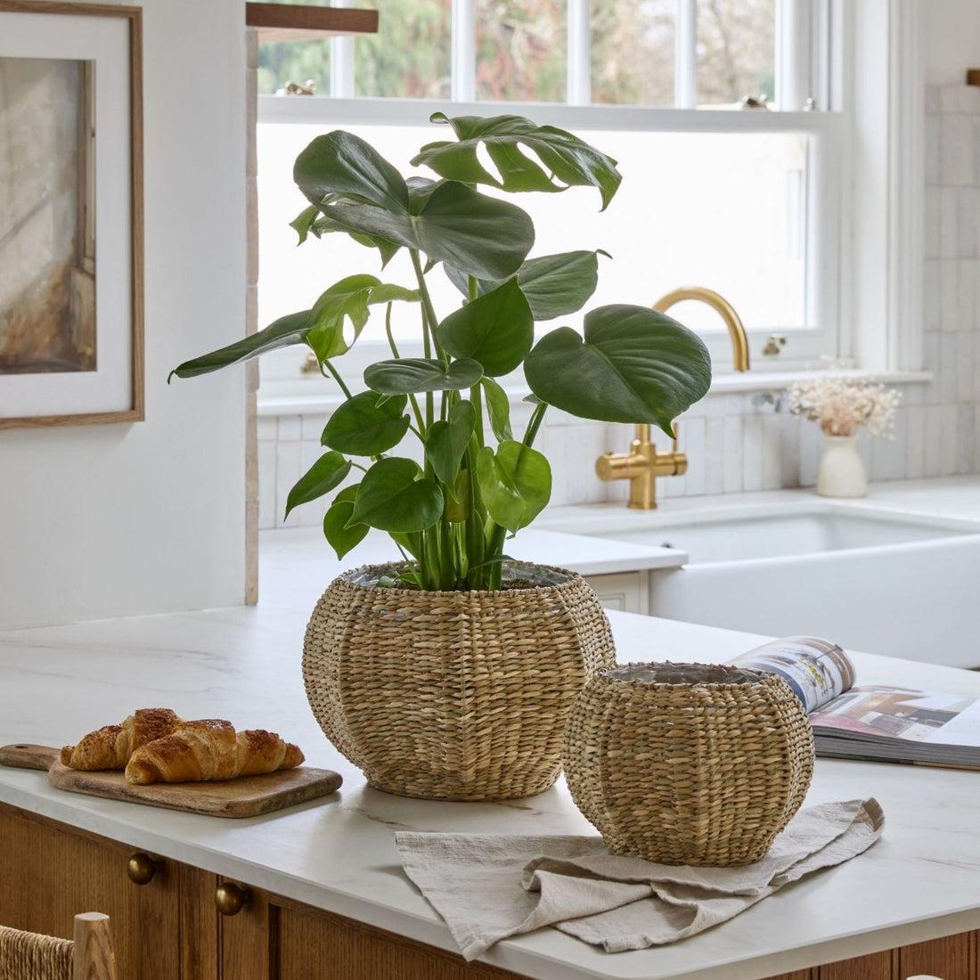 Norwick natural seagrass pumpkin-shaped basket, available in small and large sizes for autumn styling and storage.