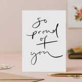 Oh Squirrel So Proud of You handwritten congratulations card on textured cardstock.