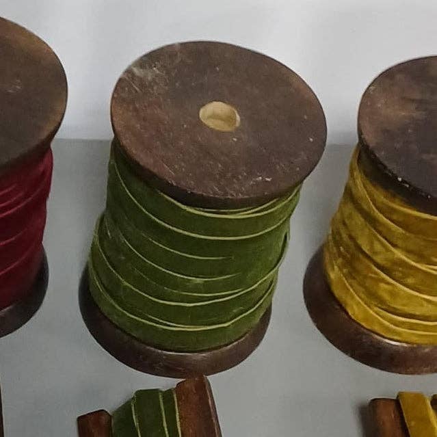 Olive green 10mm velvet ribbon for luxury gift wrapping and crafts, available in 3 metres on a wooden biscuit or 10 metres on a wooden spool.