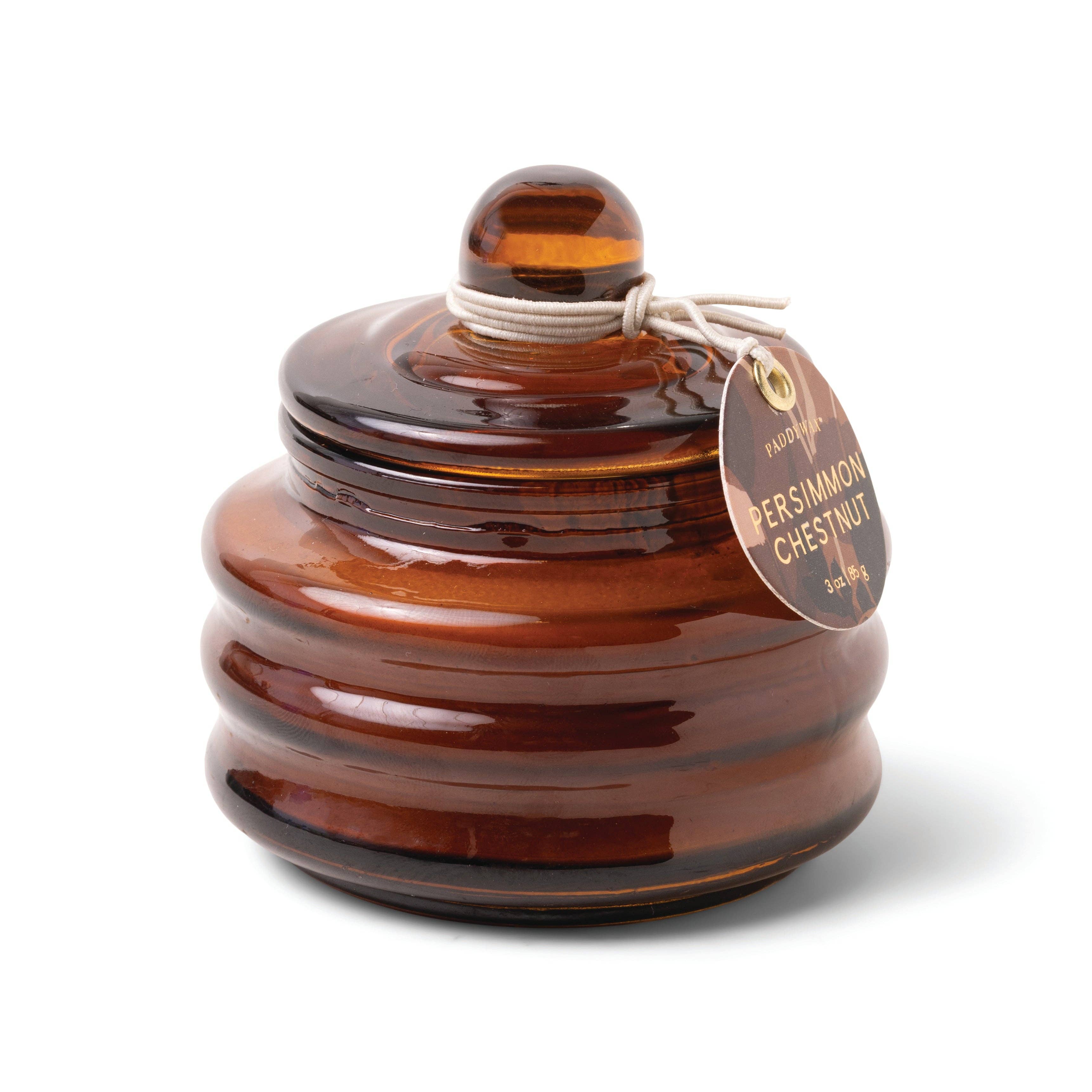 Paddywax Beam Amber Persimmon and Chestnut scented candle with glass lid