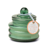 Paddywax Beam green glass candle in fresh Cypress and Fir evergreen fragrance.