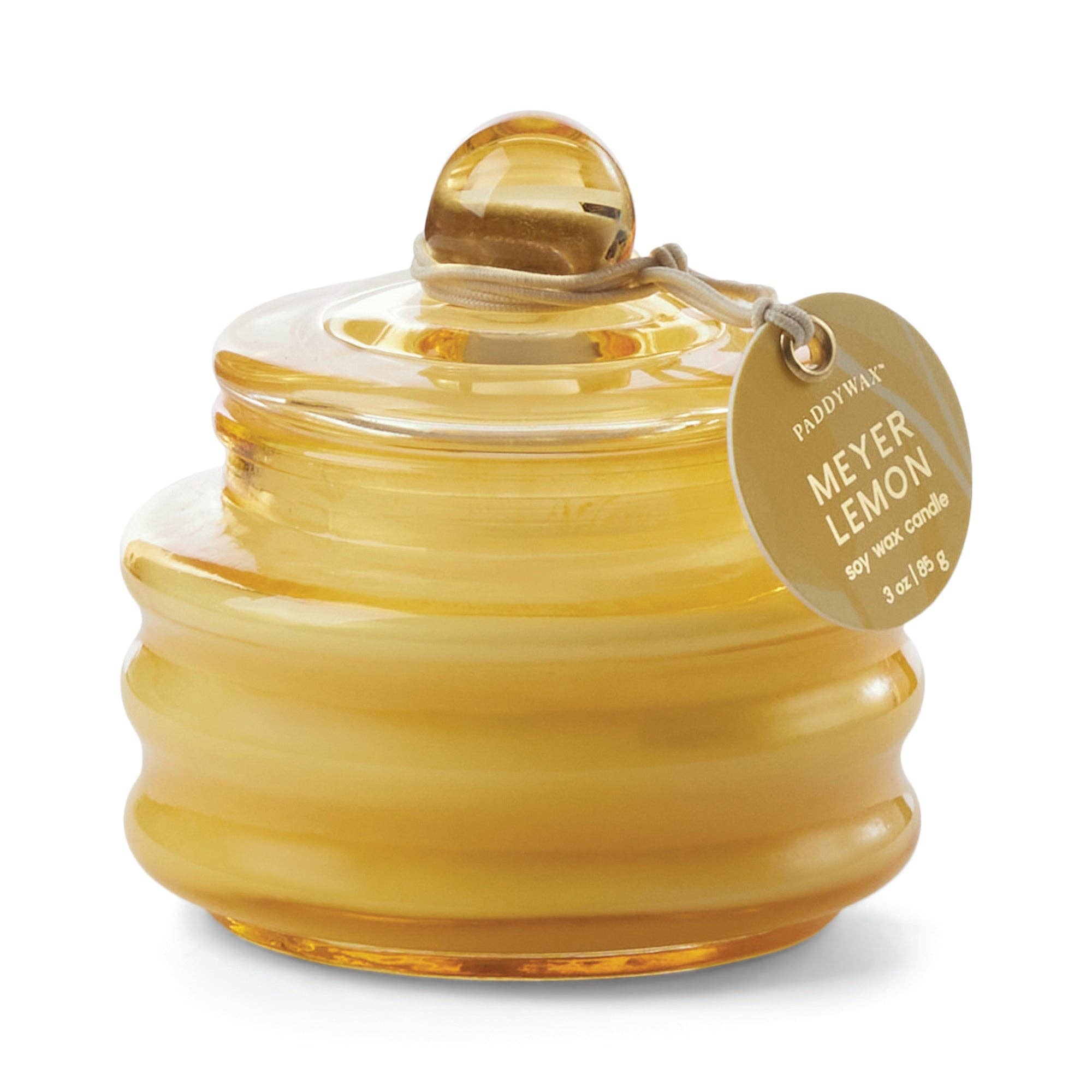 Paddywax Beam Meyer Lemon Candle in a bright yellow glass vessel with decorative lid.