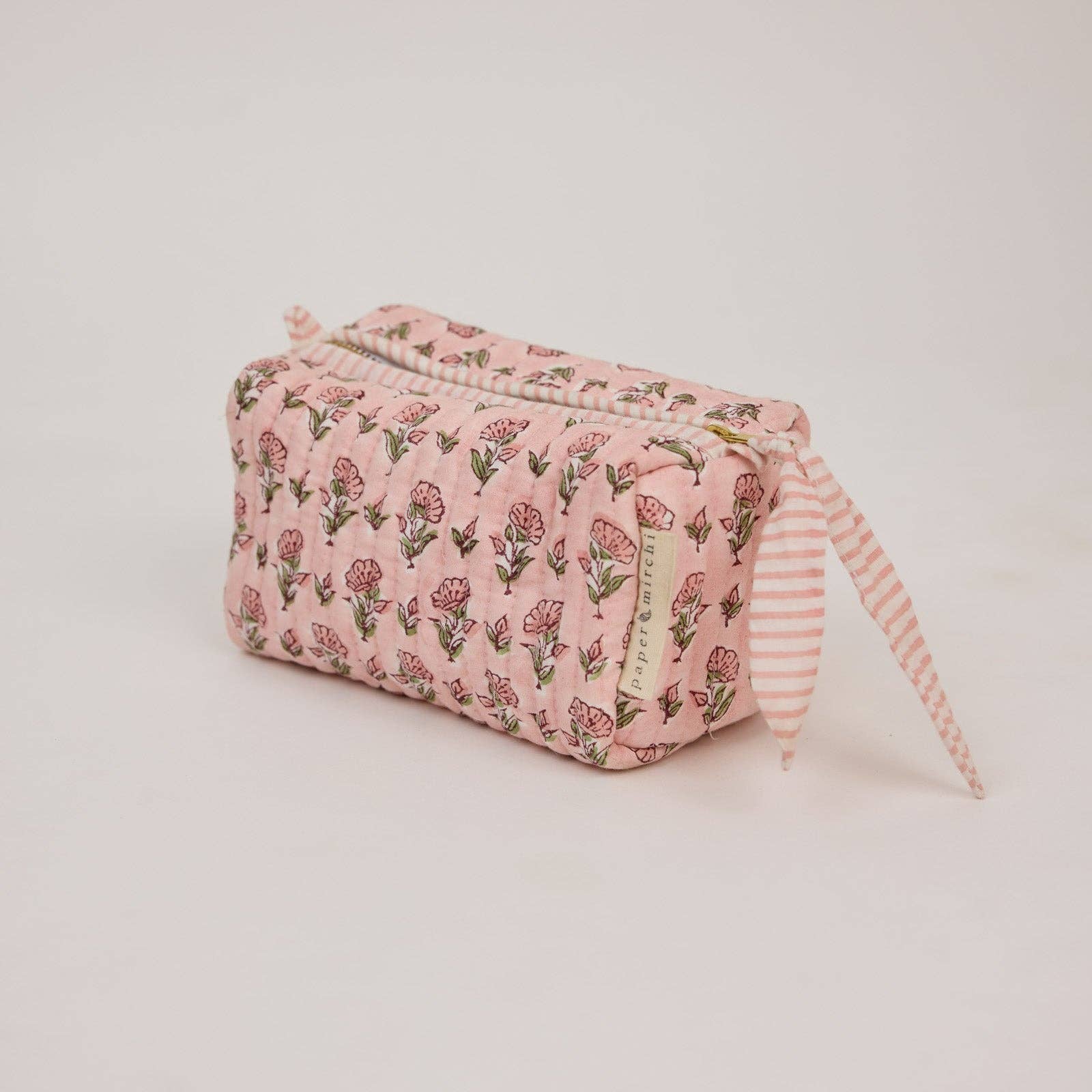 Paper Mirchi Ditsy Floral Blush small toiletry bag handcrafted from quilted organic cotton.