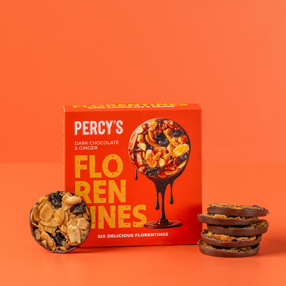 Percy's Dark Chocolate and Ginger Florentines with Fairtrade dark chocolate, caramel, crunchy nuts, fruit and warming spiced ginger.