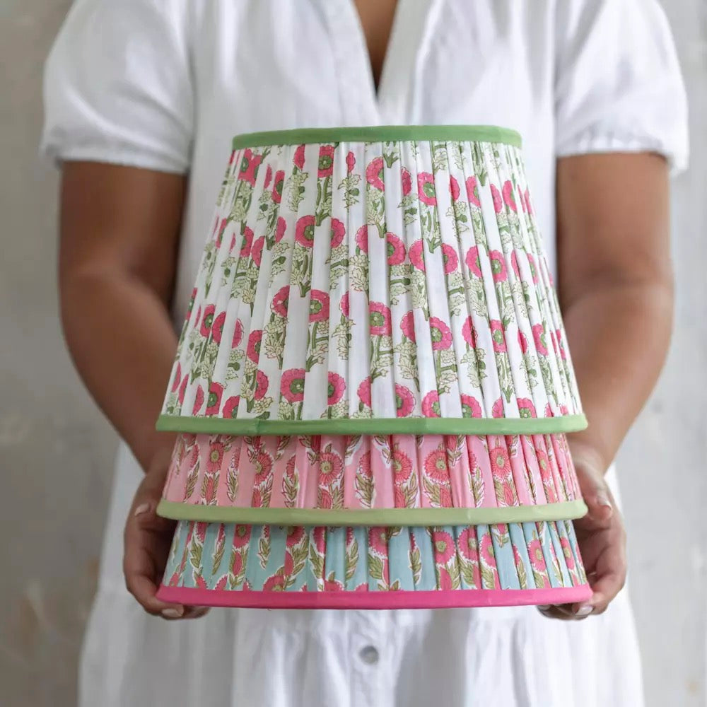 Beautiful pleated block print lampshade in natural fabric with green trim. A handcrafted 30cm shade perfect for warm ambient lighting and layered interiors.