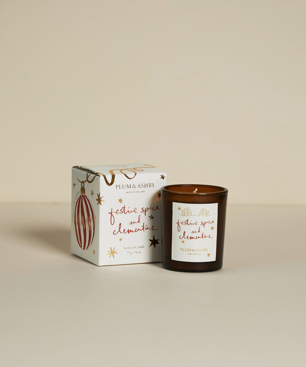 Plum & Ashby Festive Spice & Clementine Christmas votive candle in illustrated gift packaging with decorative Christmas bauble designs.