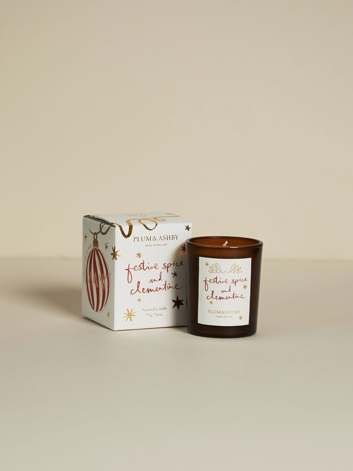 Plum & Ashby Festive Spice & Clementine Christmas votive candle in illustrated gift packaging with decorative Christmas bauble designs.