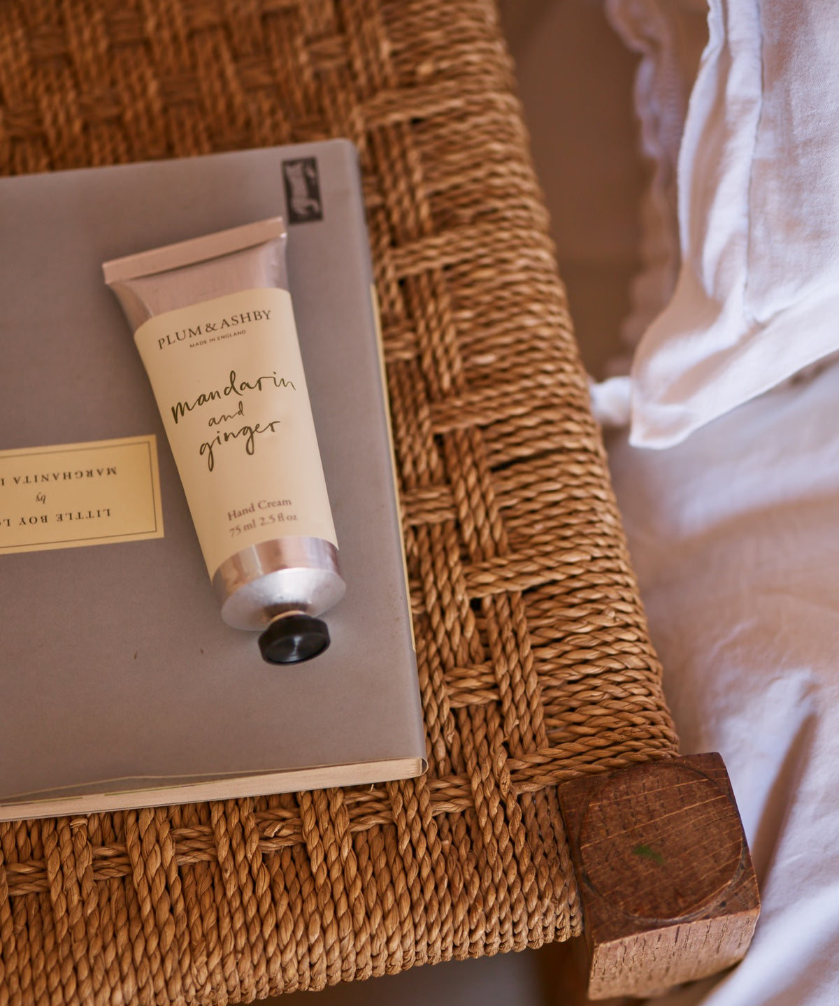 Plum & Ashby Mandarin & Ginger nourishing hand cream, enriched with cocoa and shea butter, presented in an individual gift box.