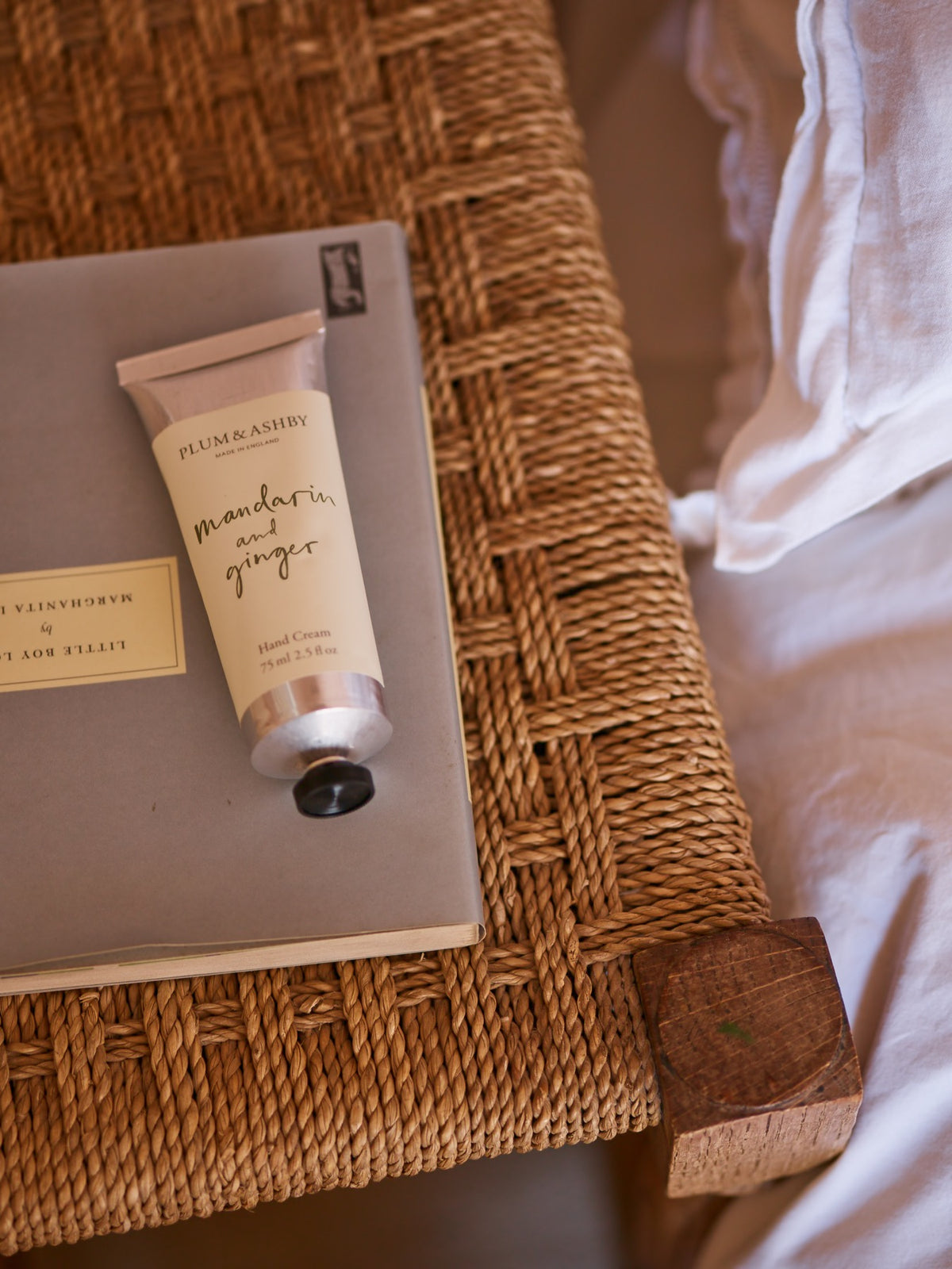 Plum & Ashby Mandarin & Ginger nourishing hand cream, enriched with cocoa and shea butter, presented in an individual gift box.