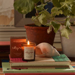 Plum & Ashby Sitting Room Votive Candle – Green Sandalwood & Fern in a recyclable glass vessel. A hand-poured natural soy wax candle with fresh violet leaf, lily of the valley, green sandalwood, vetiver and fern, designed to create a warm, calming living space.