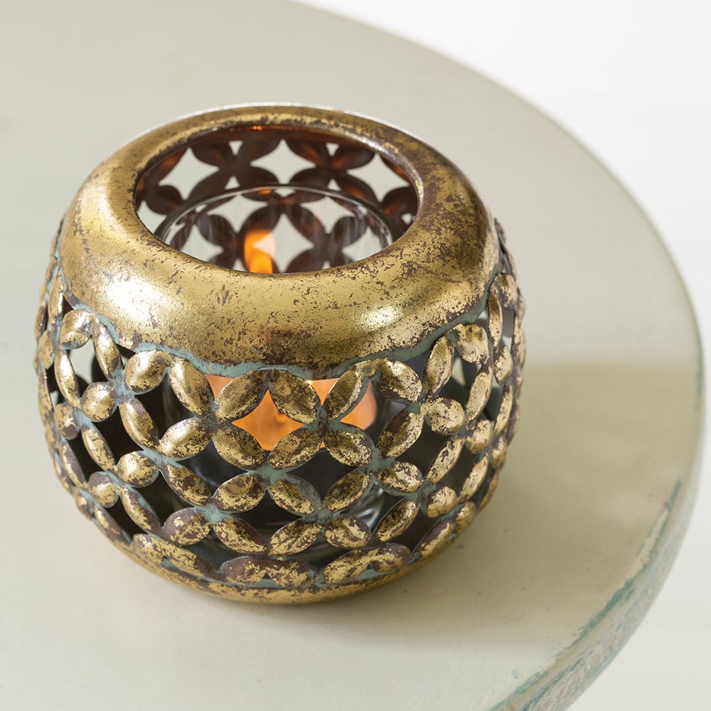 Small Pomme rustic metal tealight candle holder with decorative pierced pattern