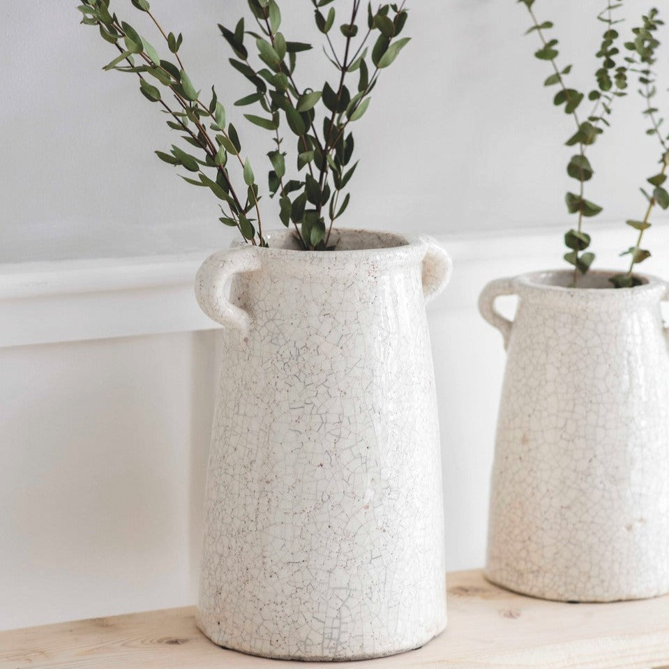 Ravello white ceramic vase with rustic crackle glaze and chunky side handles, available in small 25cm and large 31cm sizes.