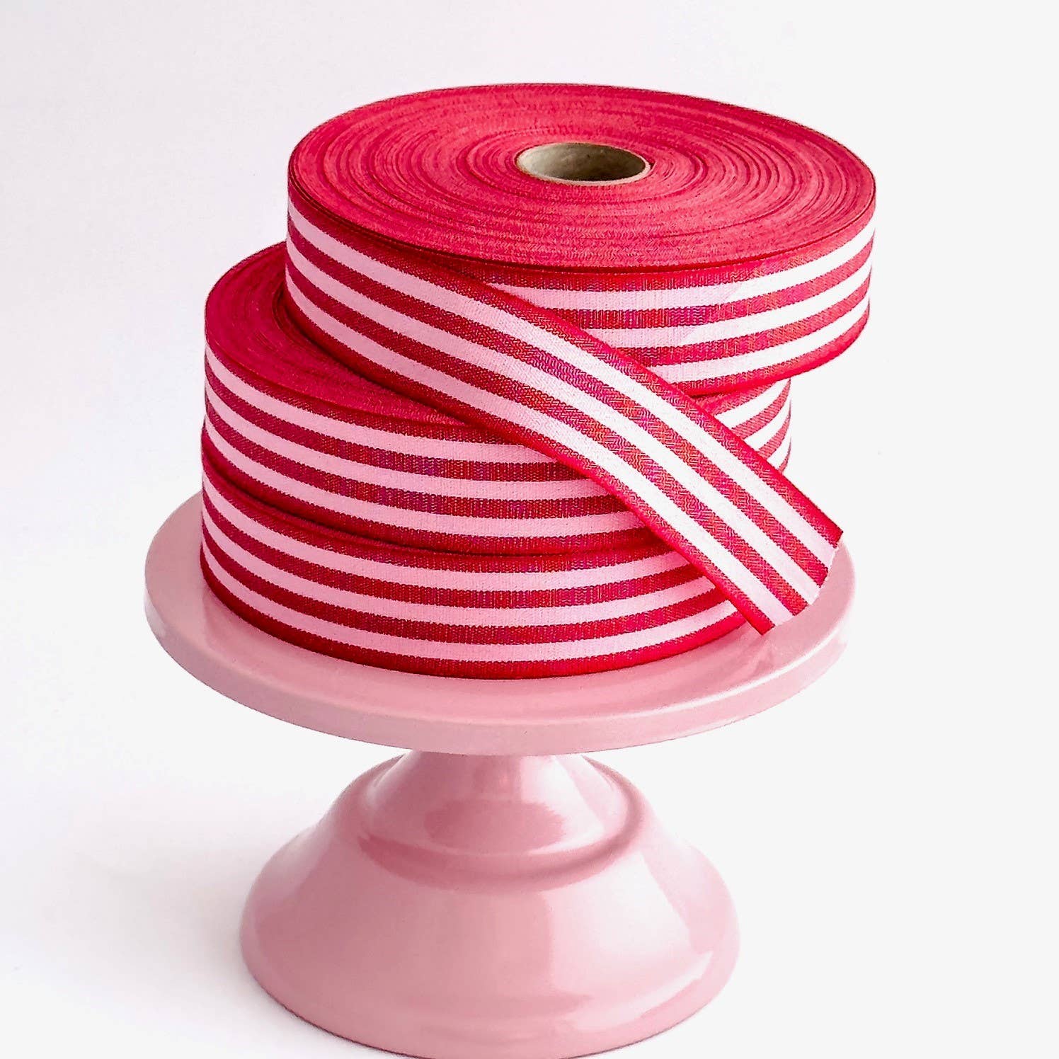 Red and candy pink multistripe cotton ribbon, 35mm wide, for colourful gift wrapping, bows and creative crafts.
