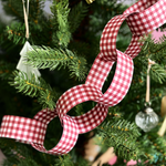 Red gingham Christmas paper chain garland kit with 40 FSC-certified paper strips for making a traditional 3 metre festive decoration.