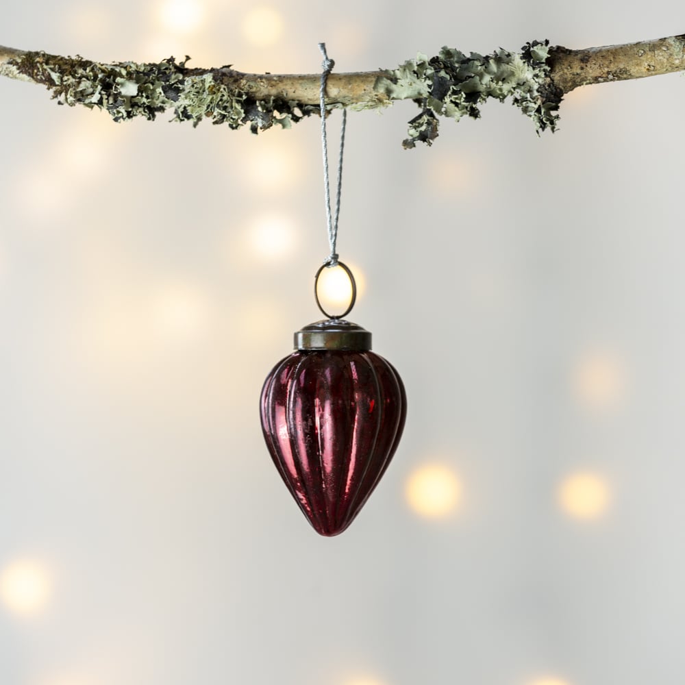 Ribbed gourd hanging Christmas decoration with a textured reflective finish for festive tree styling.