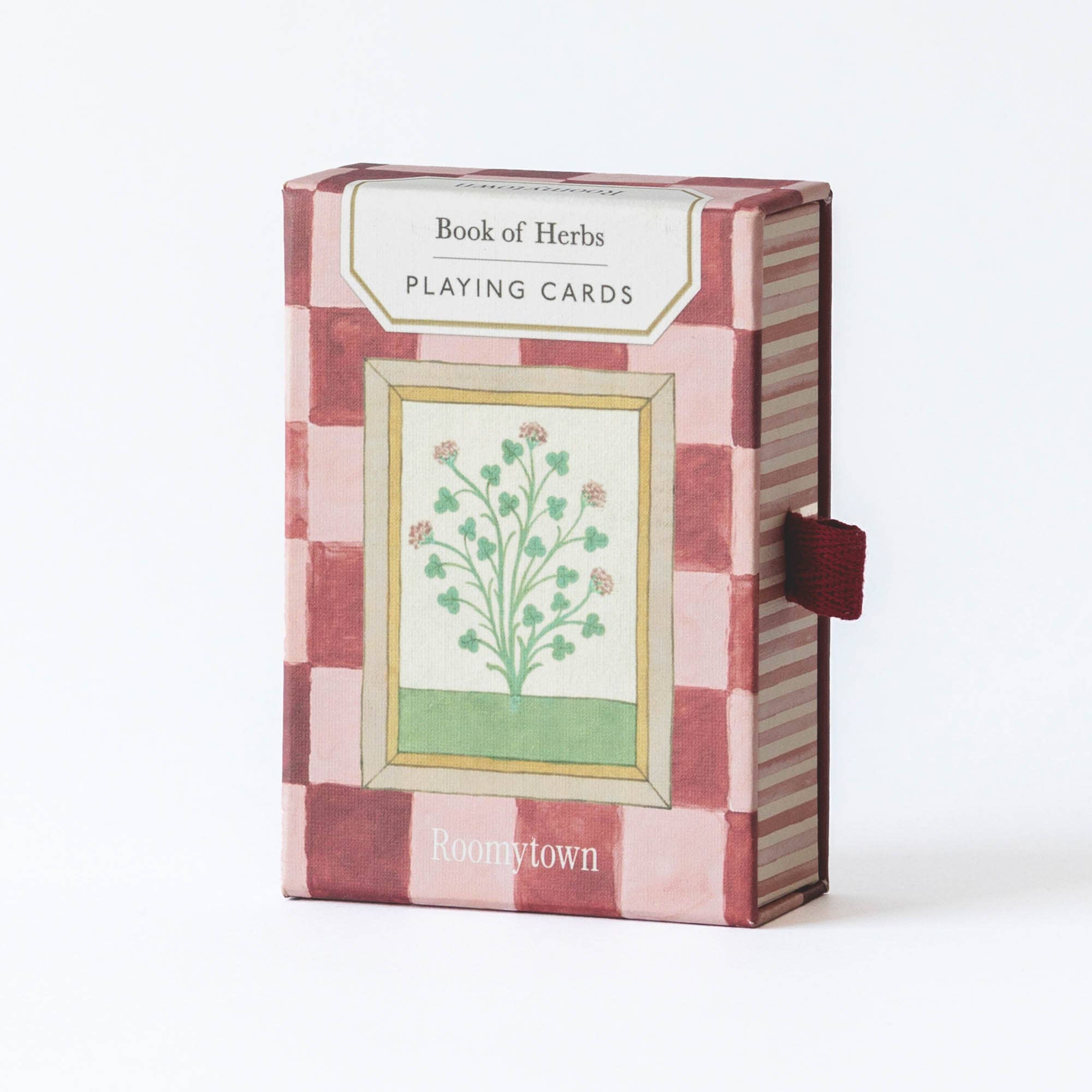 Roomytown Book of Herbs botanical playing cards featuring vintage herb illustrations and a pink check patterned reverse in a luxury gift box.