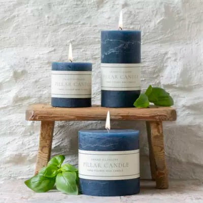 Elegant inky blue rustic pillar candle with a textured finish and warm even burn. Perfect for dinner parties, cosy evenings and contemporary home styling.