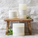 Classic white rustic pillar candle with a textured finish and warm even burn. Available in 3 sizes for tablescapes, cosy interiors and elegant home styling.