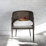 Sari ivory rattan chair with Scandinavian-inspired design for living room or bedroom styling.