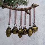 Shop our Small Olive Green Crackle Glass Christmas Baubles, hand-blown with a beautiful light-catching finish, ornate caps and coordinating organza ties.