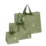 Sophie Allport Festive Forest Christmas gift bag featuring hedgehogs, badgers, hares and squirrels on a rich olive green background.