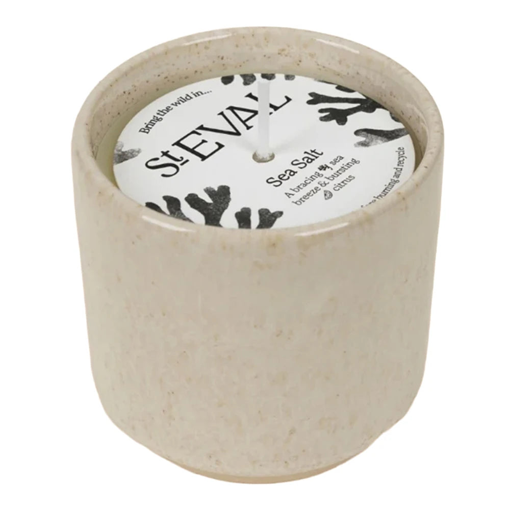 t Eval Sea Salt Sand Dune Candle, a fresh coastal fragrance of sea salt, florals, amber, oakmoss and musk in a reusable ceramic pot.