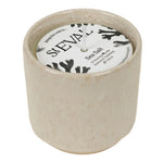 t Eval Sea Salt Sand Dune Candle, a fresh coastal fragrance of sea salt, florals, amber, oakmoss and musk in a reusable ceramic pot.