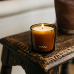 St Eval Tranquillity Amber Glass Candle with lavender and clove fragrance.