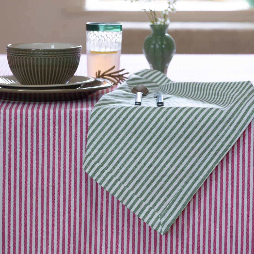 Elegant cotton striped tablecloth in Lipstick Pink with classic ticking stripe detail. Perfect for everyday dining, garden tables and relaxed entertaining.