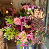 The Copper Hour luxury autumn flower bouquet featuring copper Vienna blooms, plum snapdragons, pink nerines, blue echinops, coral hypericum berries and autumn oak leaves.