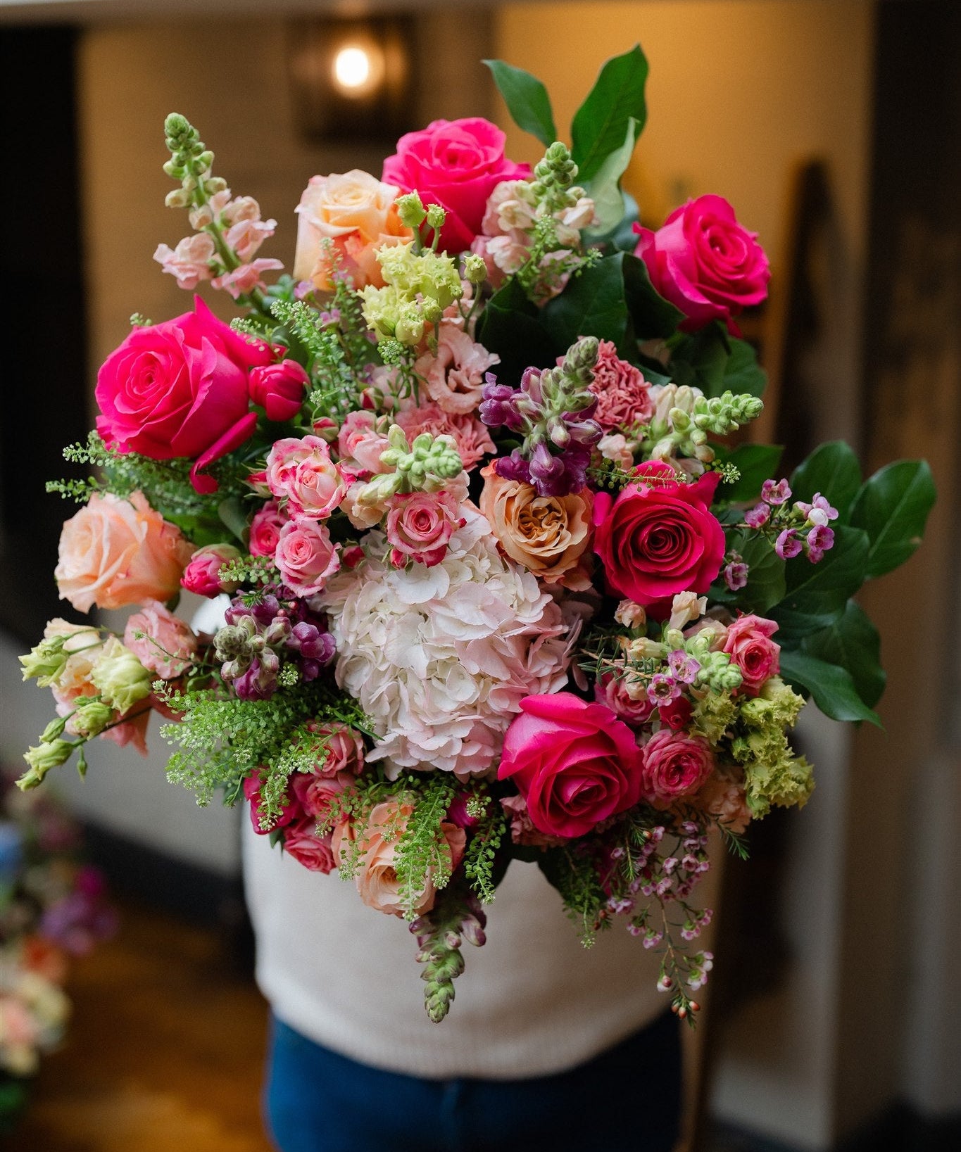 Luxury statement bouquet featuring roses, hydrangeas and seasonal flowers in an abundant garden-inspired design.