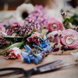 The Freshly Gathered Subscription by Mad Lilies featuring fresh seasonal flowers beautifully wrapped and ready to arrange at home.