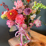 The Keepsake Hug seasonal flower arrangement in a reusable glass jar